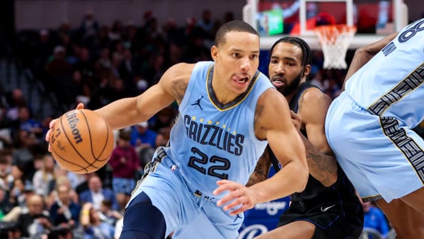 Dec 1, 2023; Dallas, Texas, USA; Memphis Grizzlies guard Desmond Bane (22) drives to the basket past Dallas Mavericks forward Derrick Jones Jr. (55) during the second half at American Airlines Center. Mandatory Credit: Kevin Jairaj-USA TODAY Sports